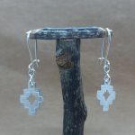 Aros Ngümin (greca o cruz simétrica)