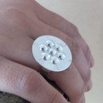 Anillo pewen rayen.  Modelo abierto Talla 12 a 15.